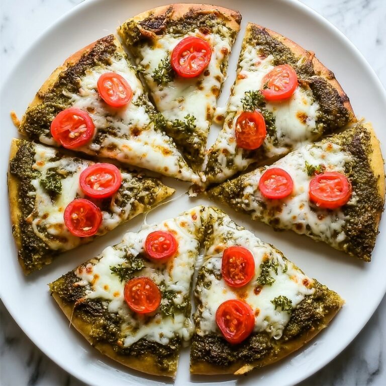 Pesto Pizza with Mozzarella, Cherry Tomatoes, and Fresh Basil Recipe
